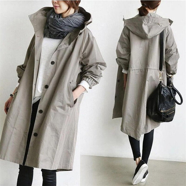 Tør og chic: Dame vandafvisende regn trenchcoat med hætte. Den ultimative efterårsjakke.