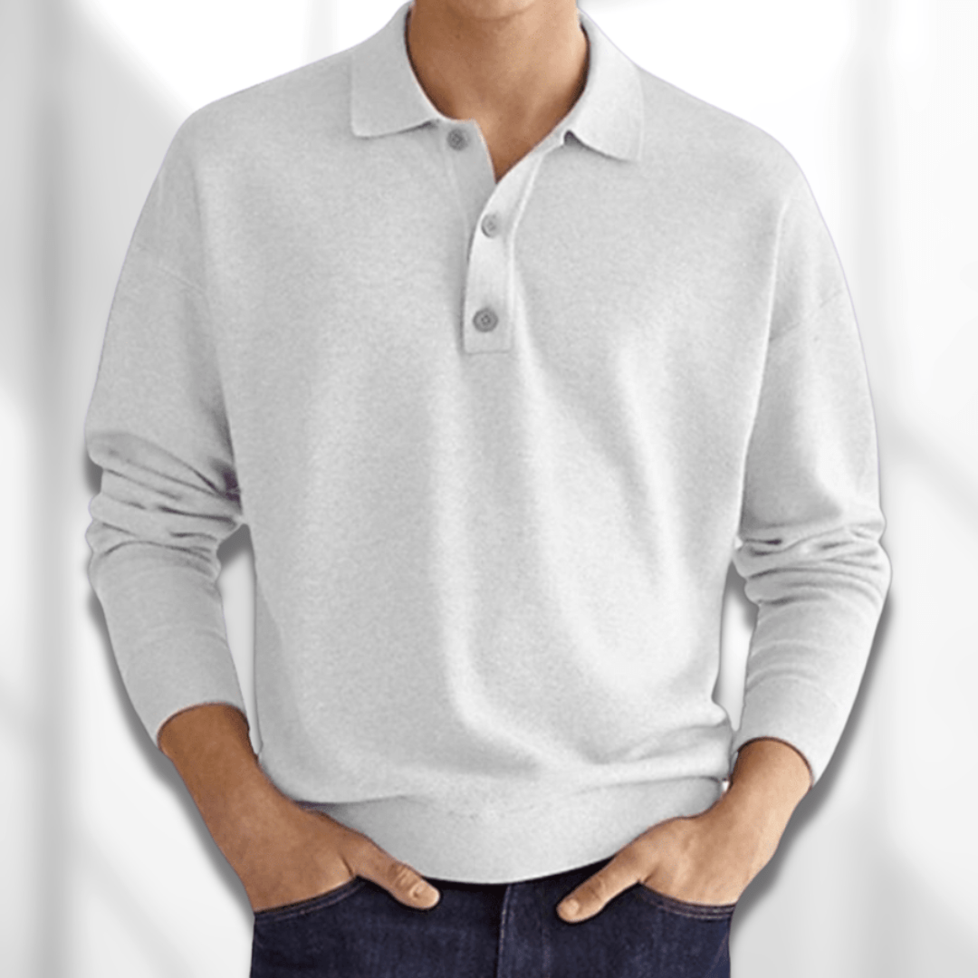 Bagfra: Klassisk mænds MetroBlend poloshirt, viser elegant pasform og kortærmet design til stilfuld hverdagskomfort.