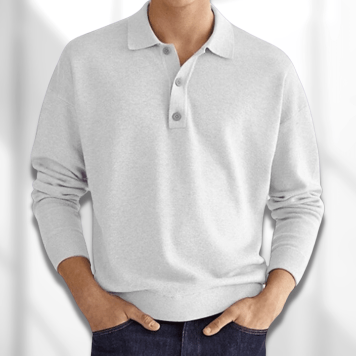 Bagfra: Klassisk mænds MetroBlend poloshirt, viser elegant pasform og kortærmet design til stilfuld hverdagskomfort.