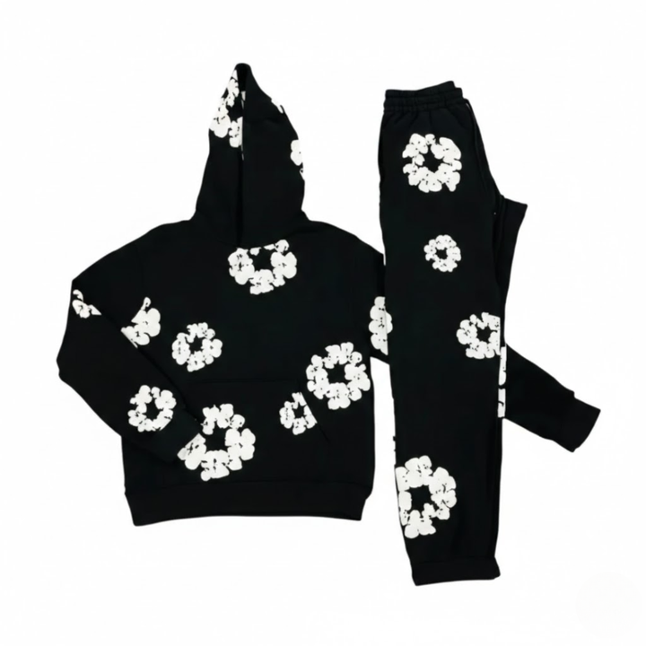 Stilfuldt blomstret træningssæt til damer, perfekt til sport, fritid og et moderne hverdagslook.