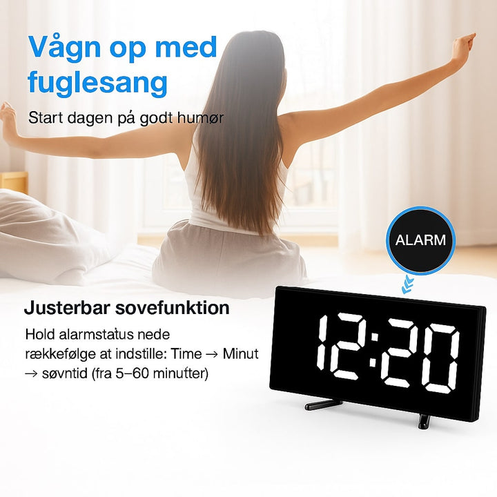 Detaljeret billede af buet LED skærm på digitalt vækkeur, viser tid og moderne æstetik.