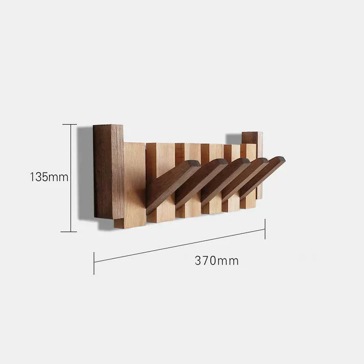 Stilfuld træ piano garderobe med klaverformede knager, ideel til gangen eller kontoret, fremstillet af robust træ.