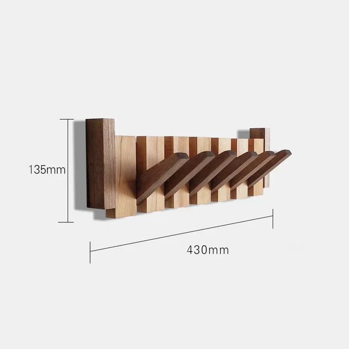 Stilfuld træ piano garderobe med klaverformede knager, ideel til gangen eller kontoret, fremstillet af robust træ.