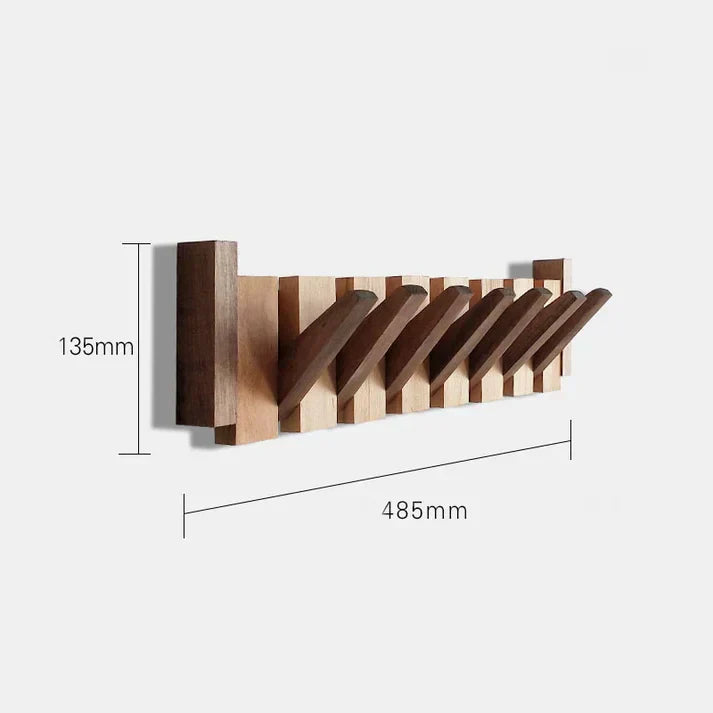 Stilfuld træ piano garderobe med klaverformede knager, ideel til gangen eller kontoret, fremstillet af robust træ.