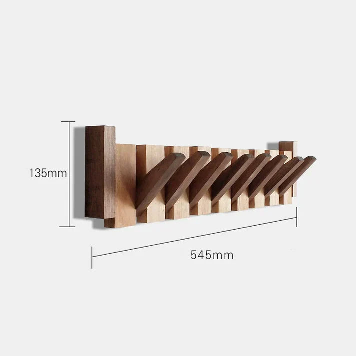 Stilfuld træ piano garderobe med klaverformede knager, ideel til gangen eller kontoret, fremstillet af robust træ.