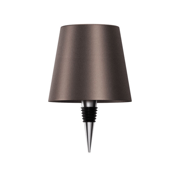 Stilfuld LED bordlampe i flaskeform med varmt lys, trådløs, genopladelig, ideel til bæredygtigt boligdesign.