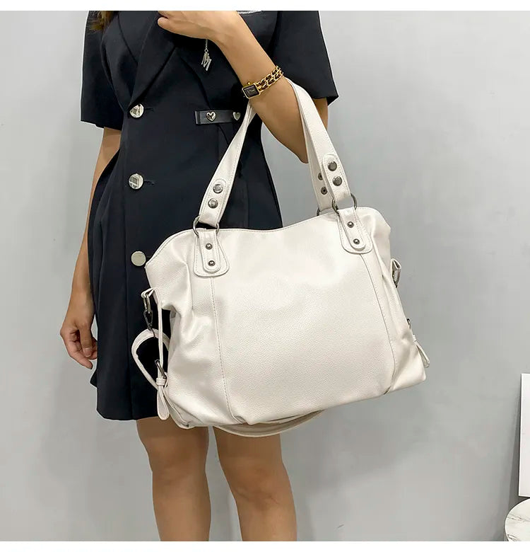 Elegant dame shopper taske. Perfekt som stilfuld skuldertaske og håndtaske med organiseret rummelighed for damemode.