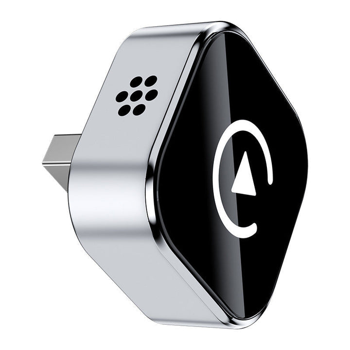 Slank sort StreamRide trådløs adapter. USB til CarPlay og Android Auto i bilen.