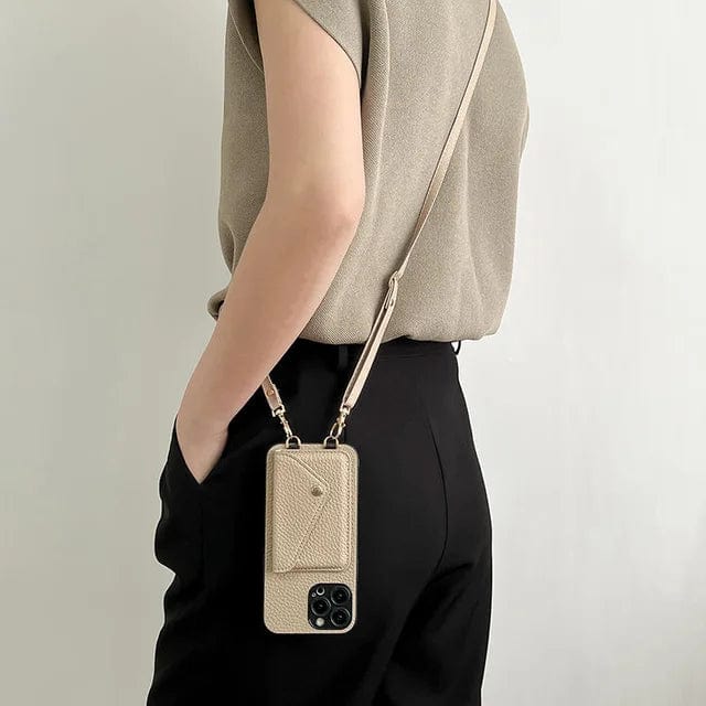 Kompakt iPhone crossbody pung med justerbar rem og kortholder. Ideel accessory til mobil og værdigenstande.