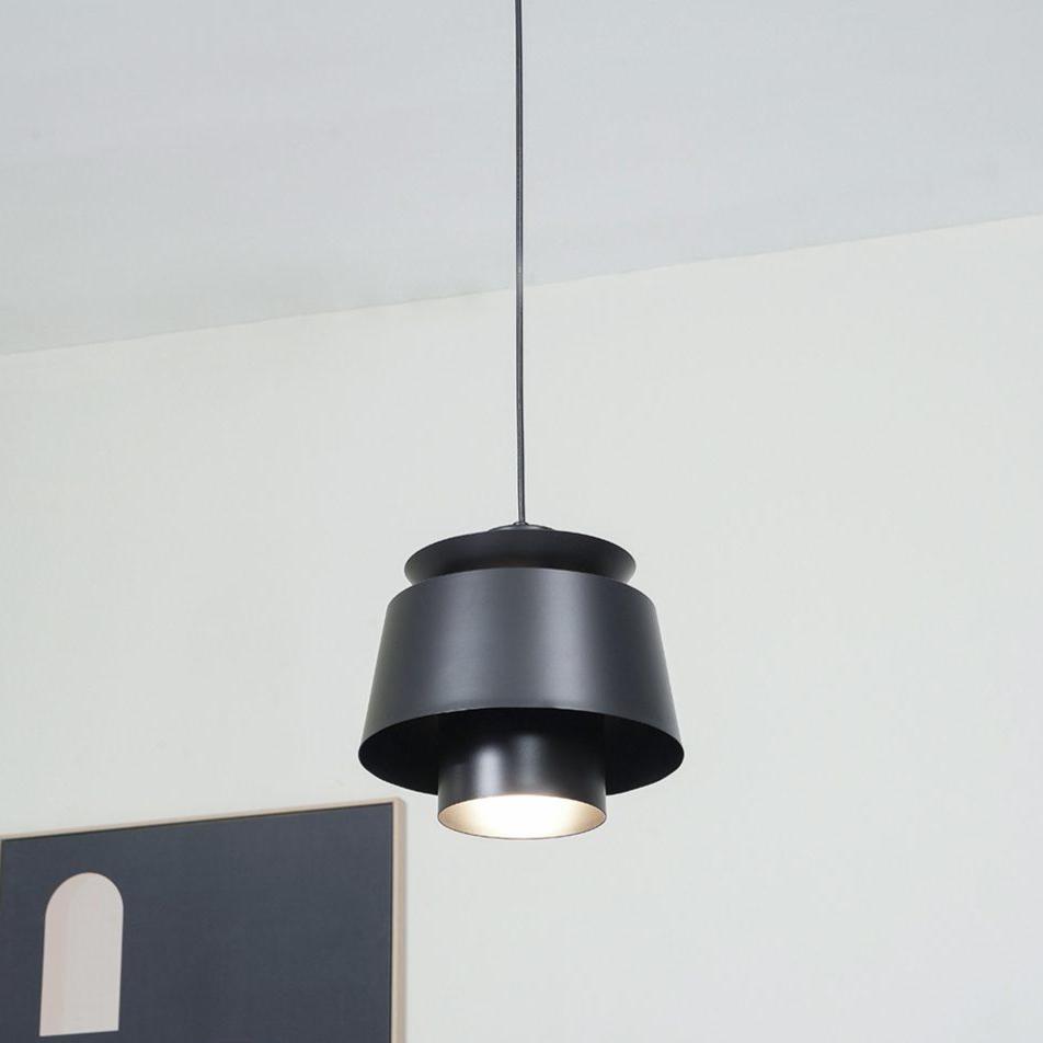 TERJE pendellampe, elegant design og reflekterende lys til moderne boliger.