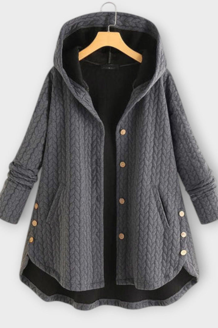 Stilfuld unisex jakke med knaplukning. Klassisk design, varm og komfortabel til hverdagsbrug i koldt vejr.