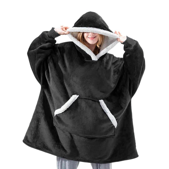 Varmt unisex hygge tæppe med hætte og ærmer, uundværligt for hyggelige stunder derhjemme.