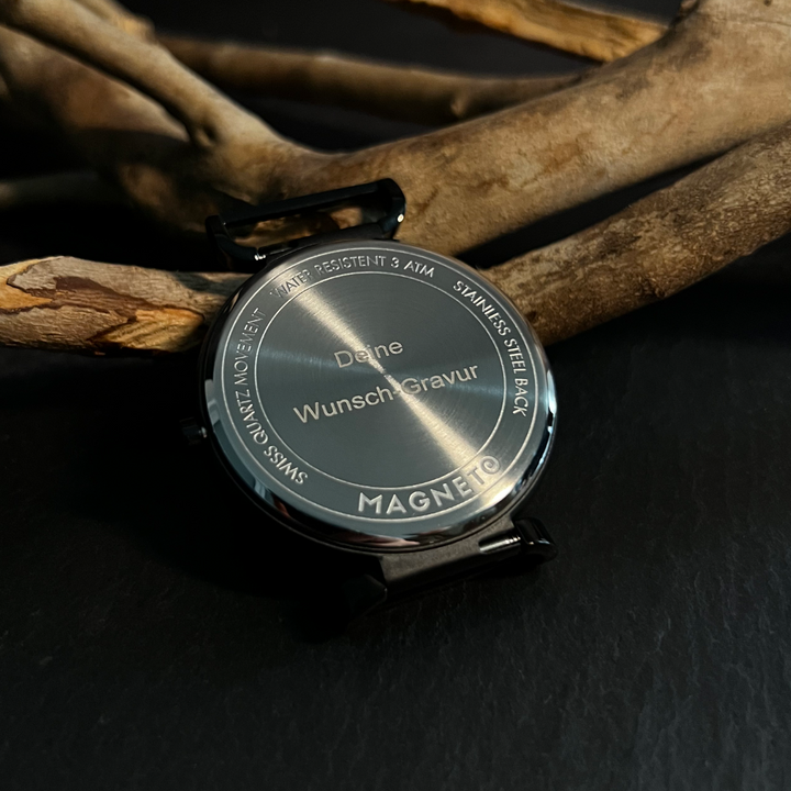 Minimalistisk magnetisk armbåndsur med innovativt kugledisplay. Et elegant unisex ur til hverdagen.