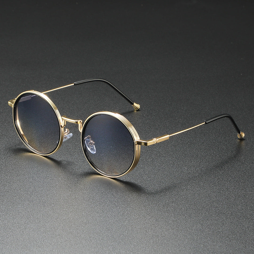 Trendy runde unisex solbriller i metal, med optimal UV400 øjenbeskyttelse, et mode must-have.