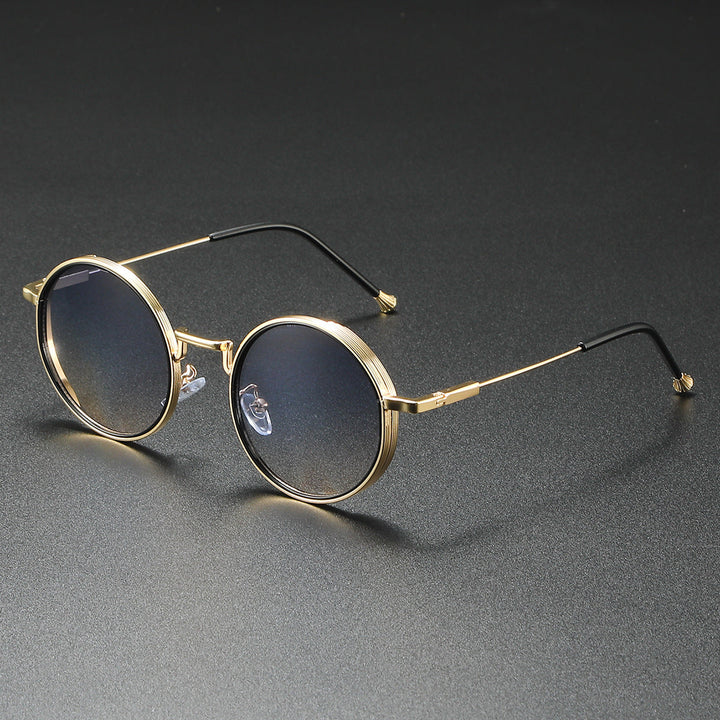Trendy runde unisex solbriller i metal, med optimal UV400 øjenbeskyttelse, et mode must-have.