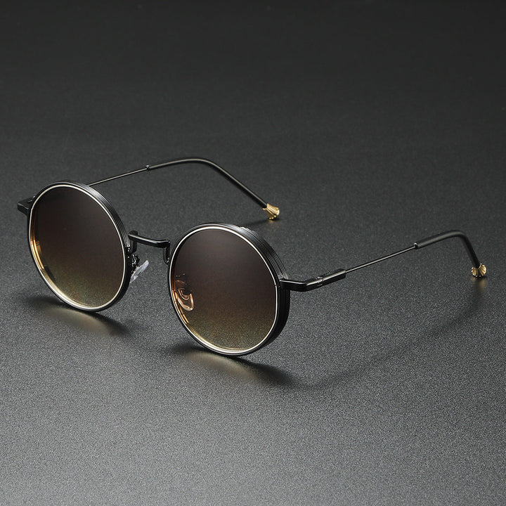 Runde metal solbriller, unisex, modeaccessorie med fuld UV400 beskyttelse og komfort.