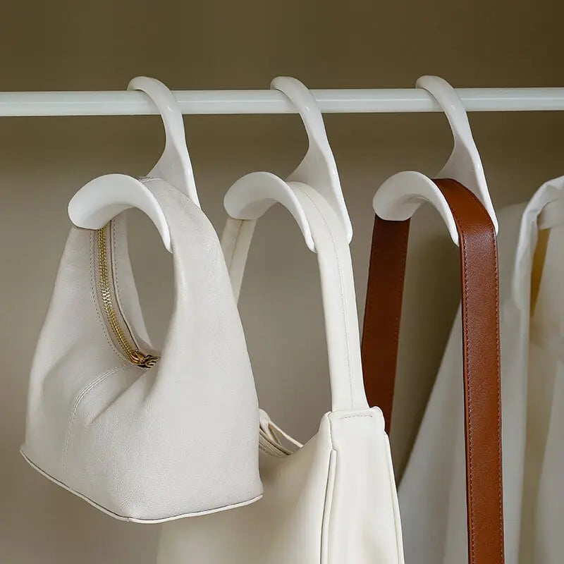 Unisex taskekrog sæt til smart opbevaring og organisering af håndtasker og rygsække. Skaber orden i hjemmet.