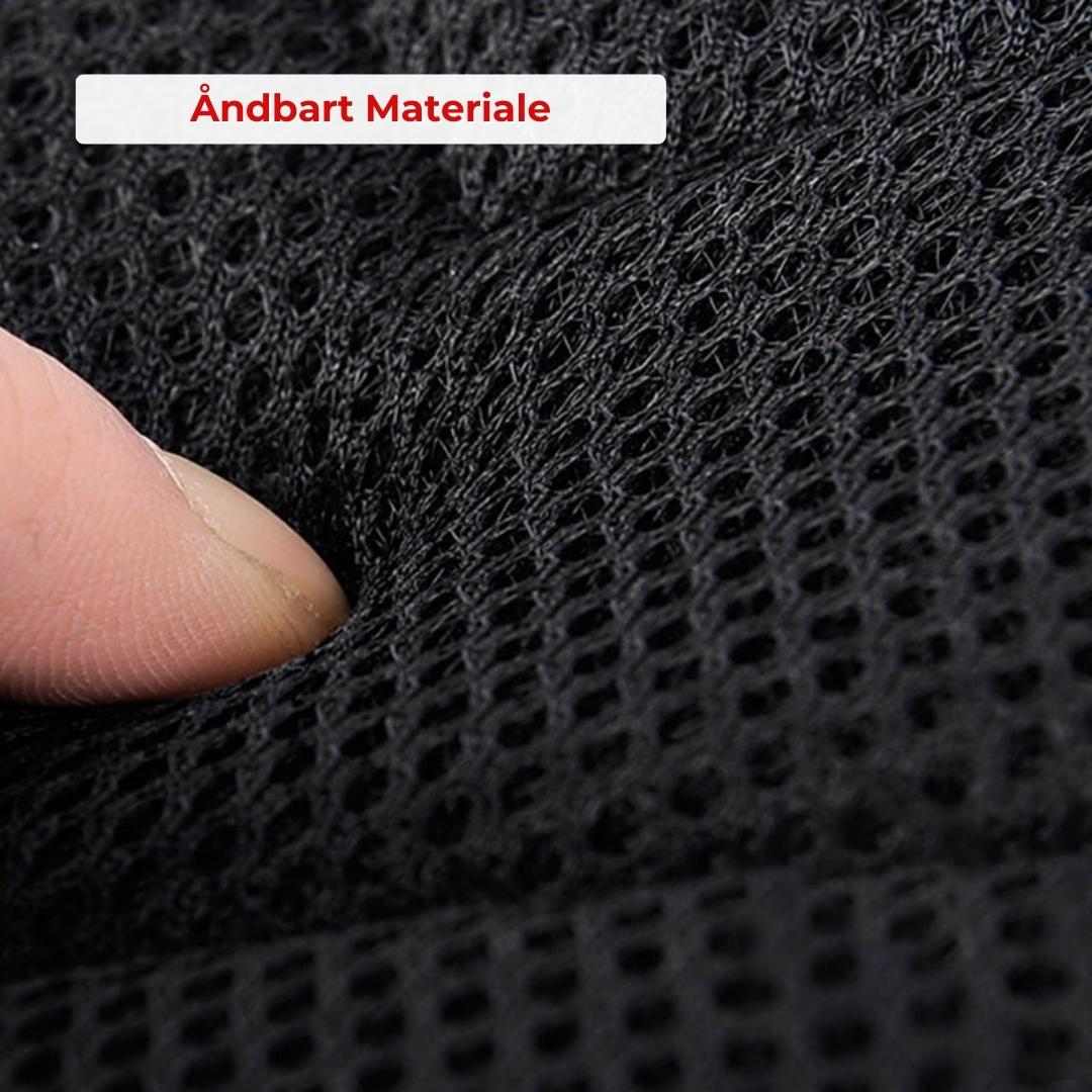 Praktisk lille skuldertaske i unisex design, perfekt til telefon og pung med USB-opladning.