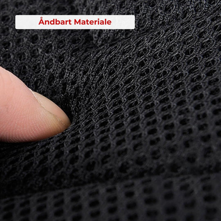 Praktisk lille skuldertaske i unisex design, perfekt til telefon og pung med USB-opladning.