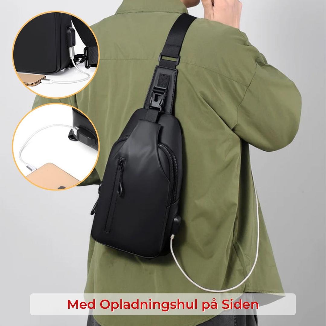 Urban vandtæt taske med USB-gennemføring til opladning af elektroniske enheder.
