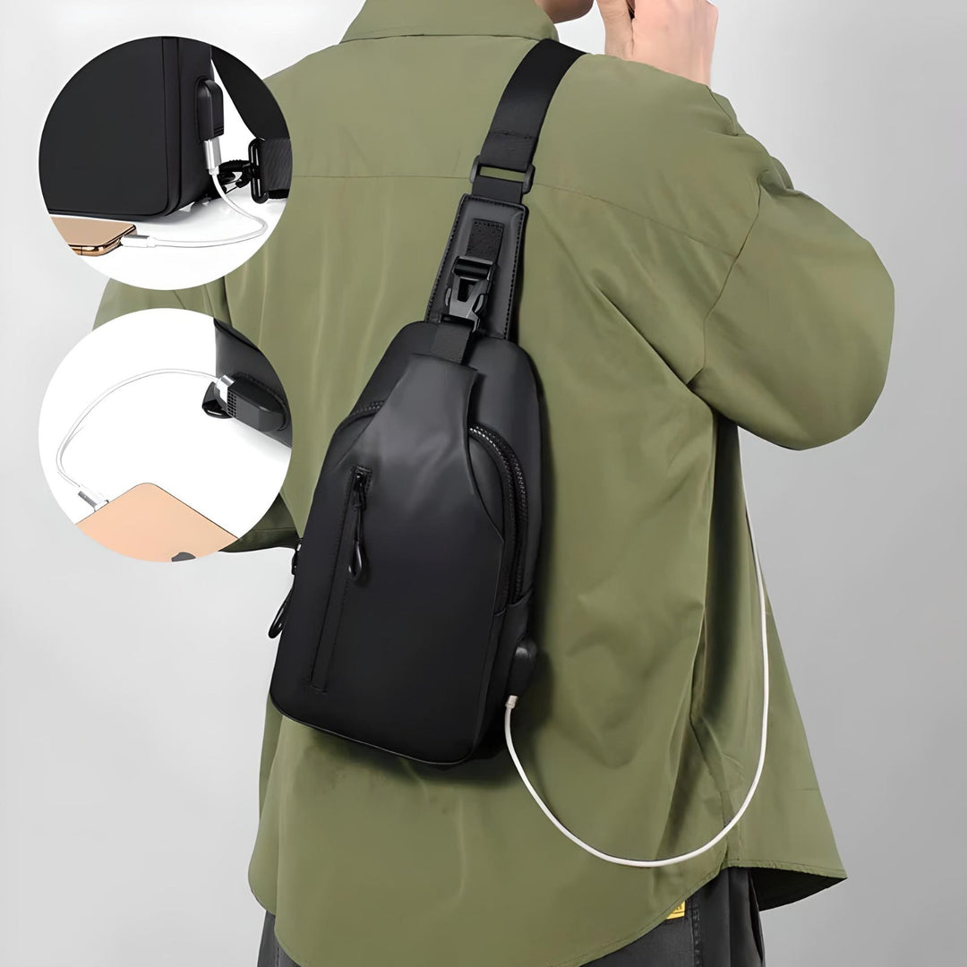 Stilfuld vandtæt skuldertaske unisex med USB port. Båret cross-body i bymiljø.