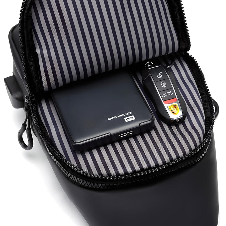 Moderne unisex skuldertaske, vandtæt med USB opladning. Perfekt til daglig brug, rejser eller festival.