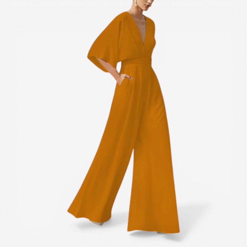 Afslappet dame jumpsuit med V-hals, løs pasform og korte ærmer til den moderne kvinde.