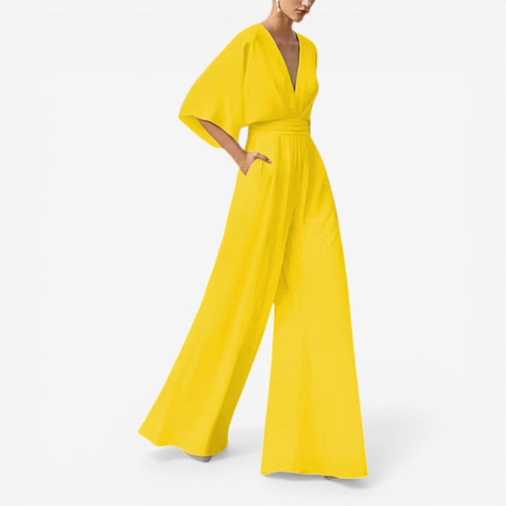 Dame jumpsuit med løs pasform og stilfuld V-hals, perfekt til casual hverdagsstil.