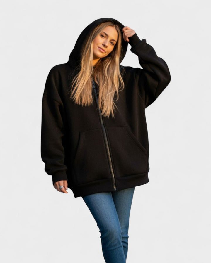 Stilren unisex hættetrøje med blødt fleecefor, perfekt til hverdagsbrug og maksimal komfort.