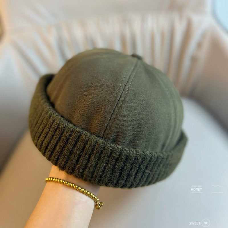 Vintage-inspireret unisex vinterhue, giver varme og stil hele vinteren.