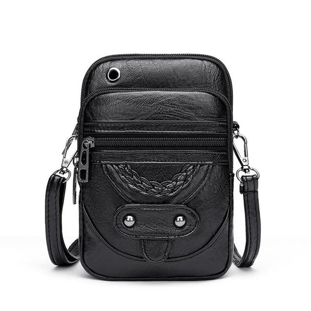 Kvinderes praktiske vintage crossbody-taske i brun PU-læder. Ideel som elegant skuldertaske.