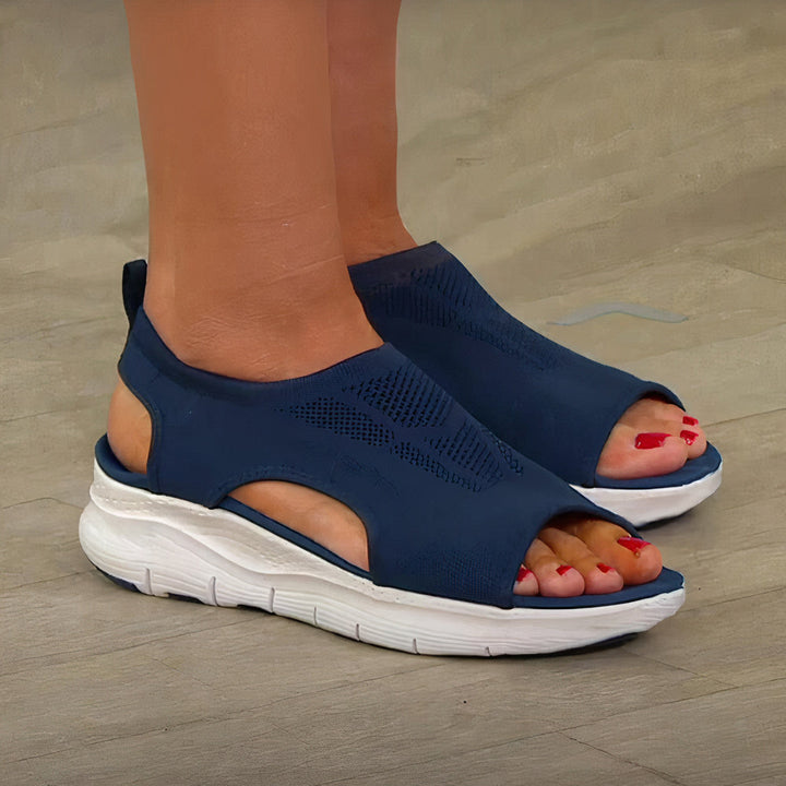 Komfortable sandaler med robust og støttende sål, velegnet til lange gåture.