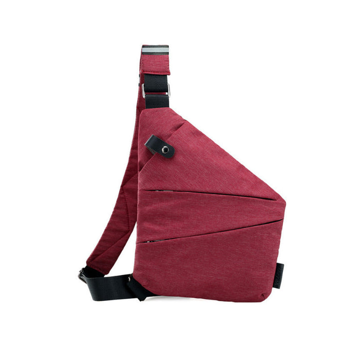 Forsiden af en tyverisikret skuldertaske i sort, med ergonomisk design, sikkerhedsrum og en holdbar nylon-polyesterblanding.