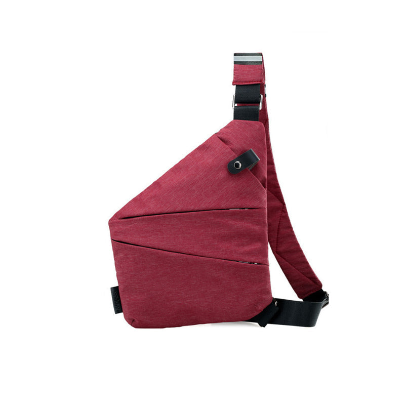 Forsiden af en tyverisikret skuldertaske i sort, med ergonomisk design, sikkerhedsrum og en holdbar nylon-polyesterblanding.