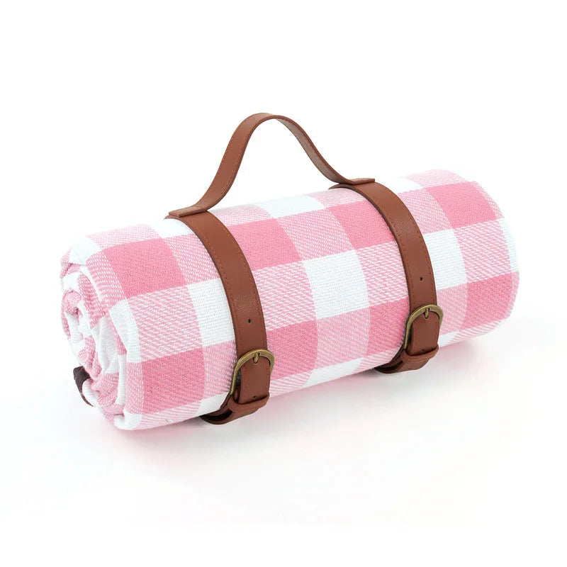 Vandtæt picnictæppe 150x200 cm, foldbart, med bærehåndtag, ideelt til camping og udendørs brug, blød blå overflade.