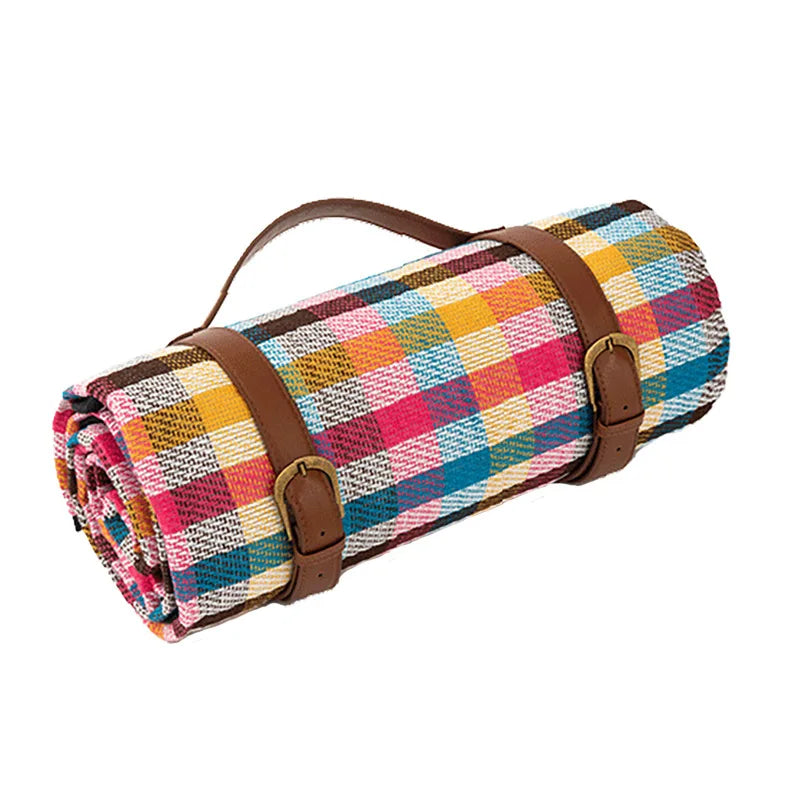 Vandtæt picnictæppe 150x200 cm, foldbart, med bærehåndtag, ideelt til camping og udendørs brug, blød blå overflade.