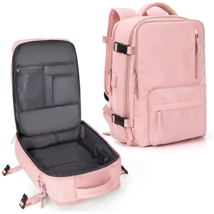Vandtæt damerejserygsæk med USB-port, 35L volumen, i blå med polstrede stropper og sikkerhedsrum.