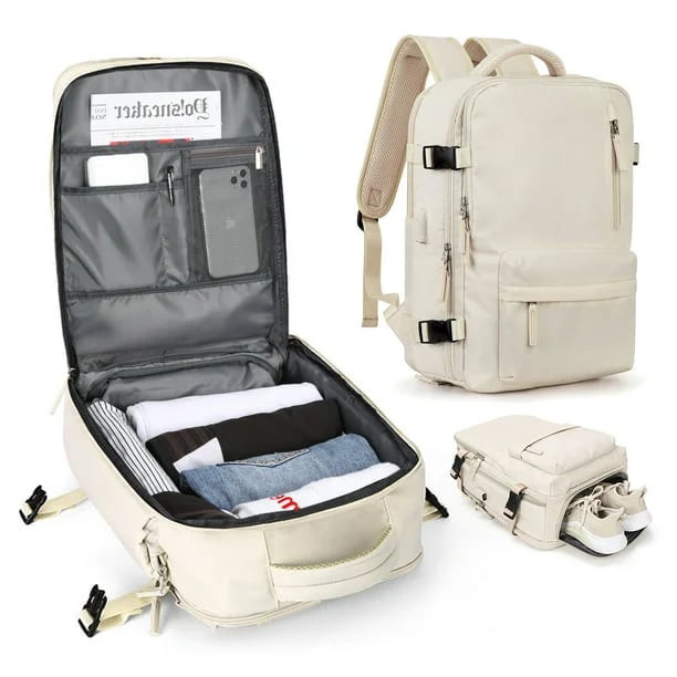 Vandtæt damerejserygsæk med USB-port, 35L volumen, i blå med polstrede stropper og sikkerhedsrum.