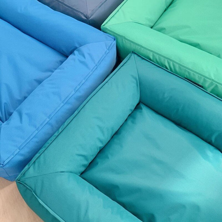 Wasserfestes Hundebett, orthopädisch, großes Modell, graues Material, mit erhöhter Kante für komfortable Kopfstütze