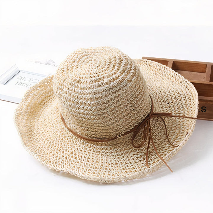 Strandhat til kvinder, en bredskygget sommerhat for optimal solbeskyttelse og sommerstil.