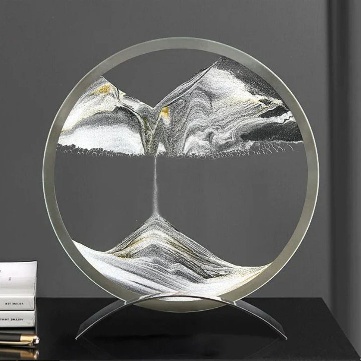 Bordlampe med levende sandkunst. Oplev dagligt fornyede sandmønstre. Moderne og afslappende design.